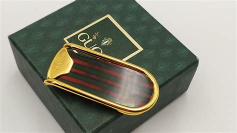 pince à cravate dorée de marque GUCCI 